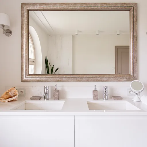 Elegant bathroom vanities with custom stone countertops, adding style and functionality to modern bathrooms.